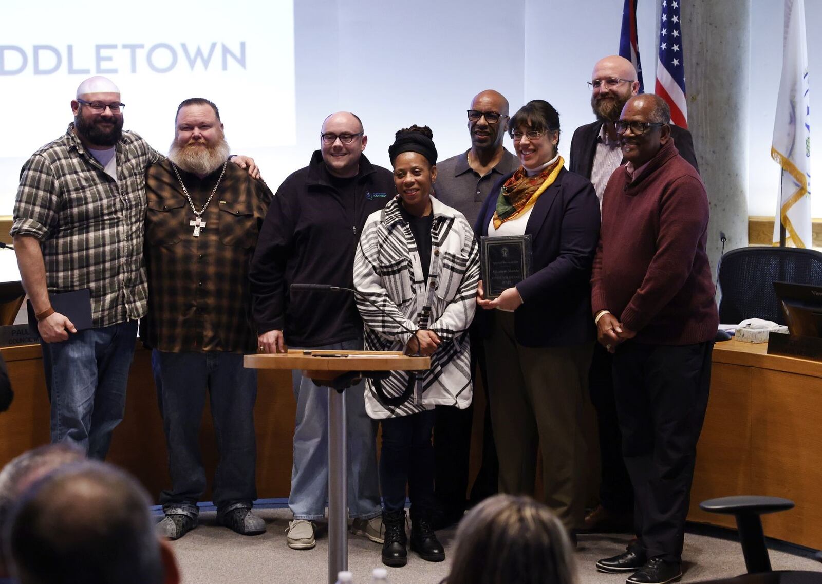 Members of the Middletown Ministerial Alliance presented awards to Verlena Stewart and Mayor Elizabeth Slamka during Tuesday's City Council meeting. From left: Scott Johnson (Crosspointe Church of Christ), Jeff Wilder (First Christian), Scotty Robertson (First Baptist), Stewart, Roger Smith (Bethlehem Temple), Slamka, Adam Profitt (Middletown Nazarene) and Michael Bailey (Faith United). NICK GRAHAM/STAFF