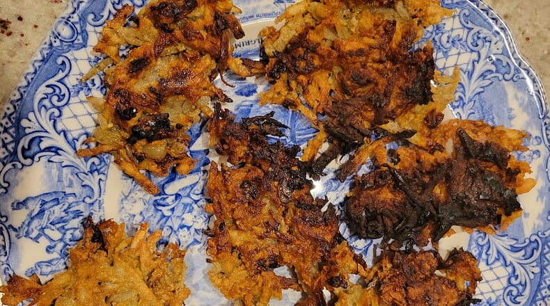 Because the small amount of oil miraculously burned for eight days, traditional Hanukkah foods are oil-based. The most distinctive dish is potato latke. CONTRIBUTED