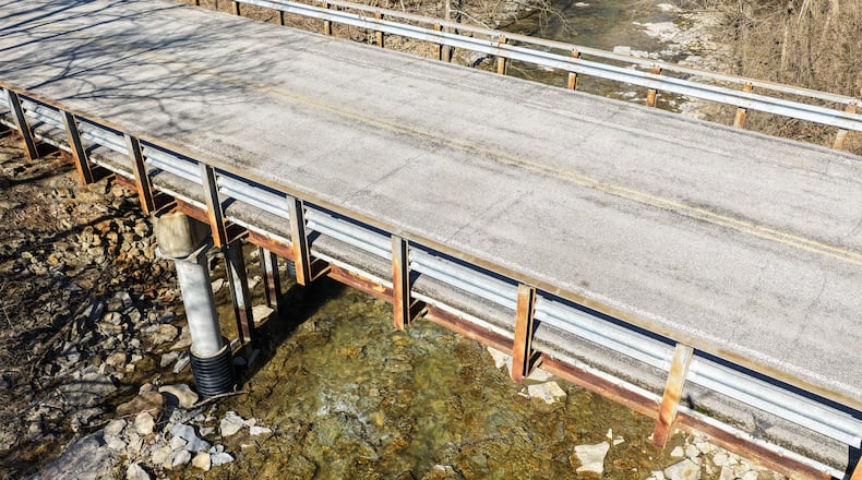 Butler County Engineer Greg Wilkens plans to spend nearly $14 million on bridge work this year to repair structures like this one on Shurz Road over Elk Creek in Wayne Twp. The cost to replace this bridge is $1.9 million and Wilkens received $1.8 million in federal funds to help pay for it. NICK GRAHAM VIA DRONE/STAFF