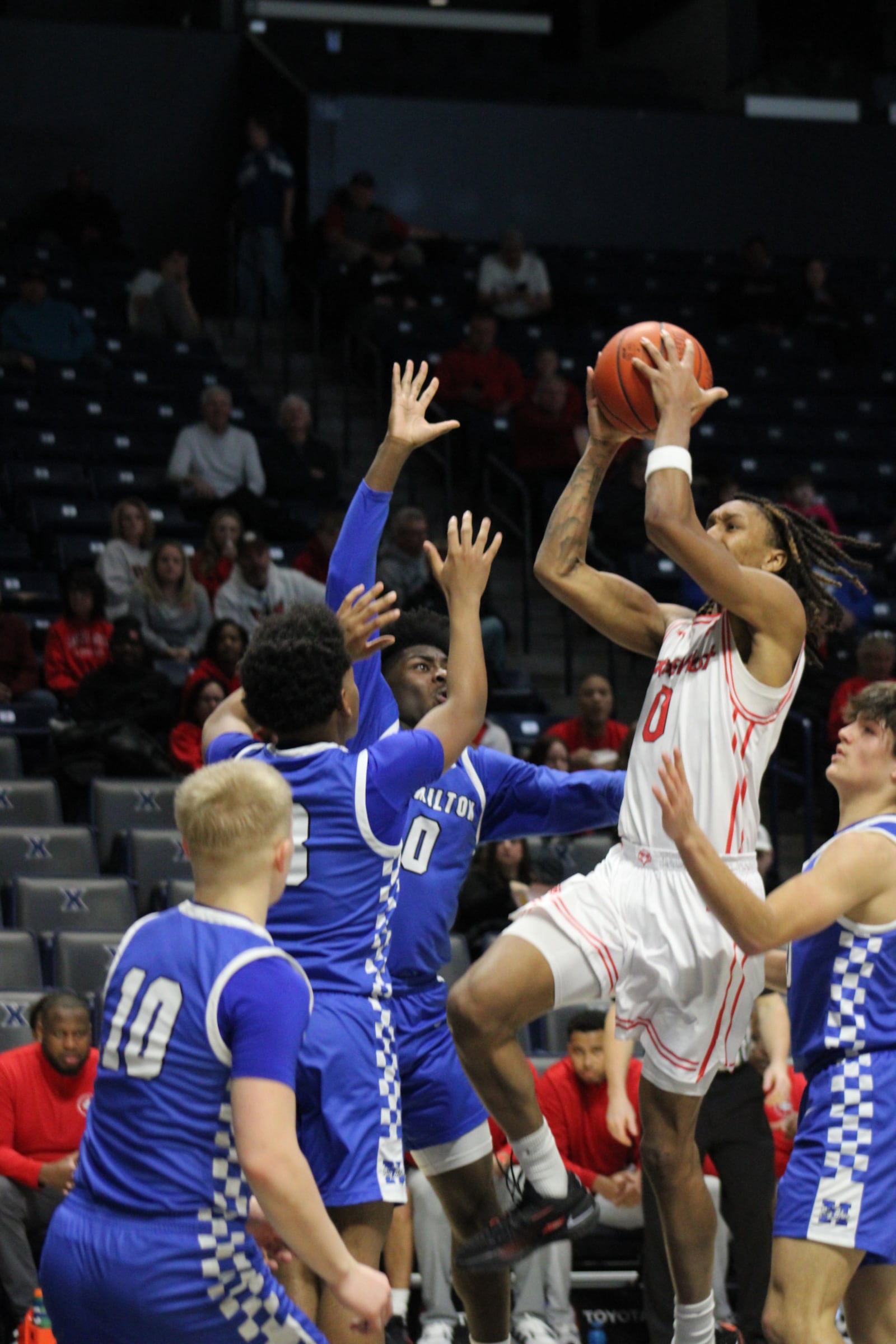 Lakota West’s Bryce Curry goes up for a shot against Hamilton at the Martin Luther King Classic on Monday, Jan. 19, 2026 at Xavier University’s Cintas Center. DIMITRIJE FISIC / CONTRIBUTED