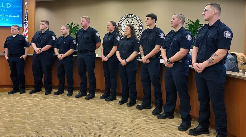 Nine firefighters were sworn in this week in Fairfield, completing the transition to a fulltime department. They are, from left: Colson Bryan, Marcus Carpenter, Austin Flannery, Jake Hendricks, Sarah Markey, Brooke Owens, Aaron Roesch, Zach Smith and Chris Spinosi. Photo: Sue Kiesewetter/Journal-News