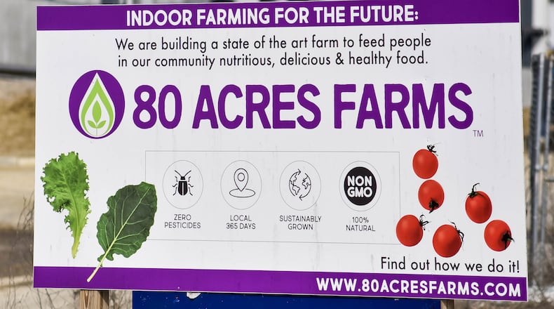 A new 55-foot-high, 70,000-square-foot building is being constructed by 80 Acres Farms on Hamilton Enterprise Park Drive in Hamilton. NICK GRAHAM / STAFF