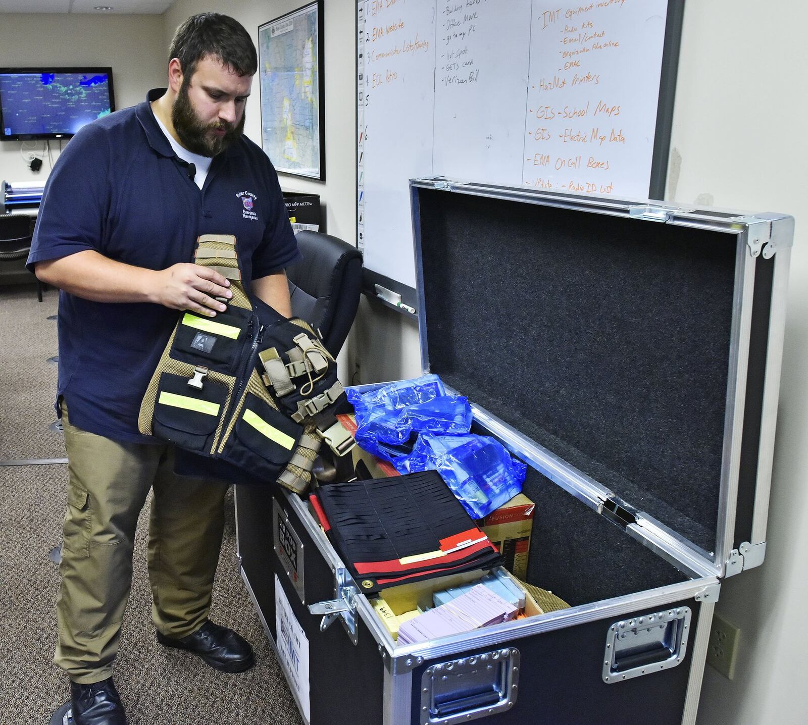 Jim Bolen, Planning and Operations Manager with Butler County Emergency Management Agency, packs supplies in advance of the group’s deployment to Florida for Hurricane Irma relief efforts. NICK GRAHAM/STAFF
