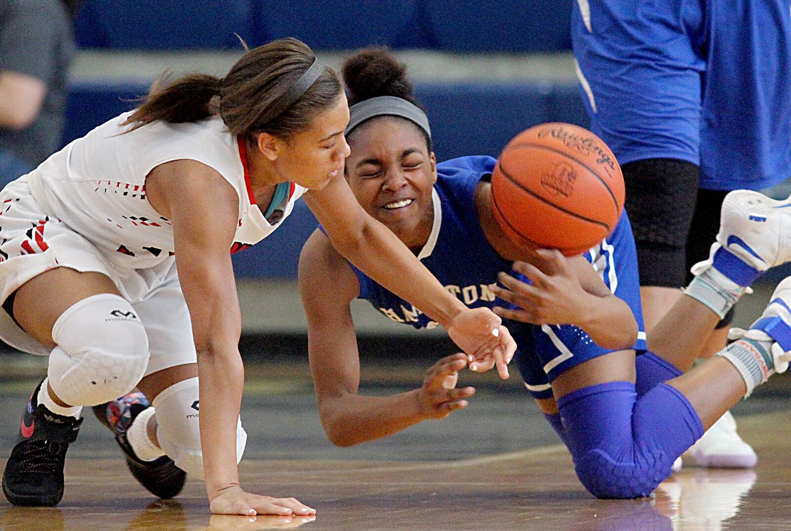 Lakota West’s Sarah Jones (left) and Hamilton’s Cici Riggins battle for a loose ball during the inaugural All-Butler County All-Star girls basketball game at the Hamilton Athletic Center on Saturday. CONTRIBUTED PHOTO BY E.L. HUBBARD
