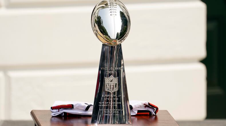 The Vince Lombardi Trophy is displayed before a ceremony on the South Lawn of the White House, in Washington, Tuesday, July 20, 2021, where President Joe Biden will honor the Super Bowl Champion Tampa Bay Buccaneers for their Super Bowl LV victory. (AP Photo/Andrew Harnik)