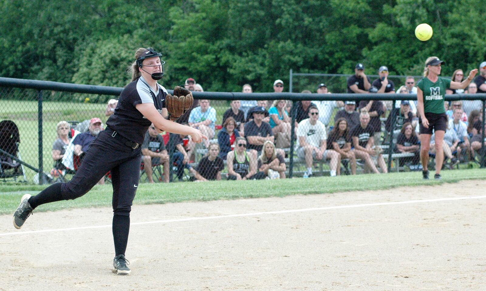 Lakota East third baseman Cassidy Hudson makes a throw across the diamond May 22 during a Division I regional softball semifinal against Mason at Centerville. East won 5-4 in 10 innings. RICK CASSANO/STAFF