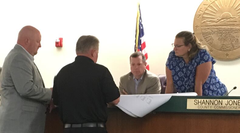 Warren County Commissioner Dave Young, second from left, with Commissioner Shannon Jones reelected Tuesday night. STAFF/LAWRENCE BUDD
