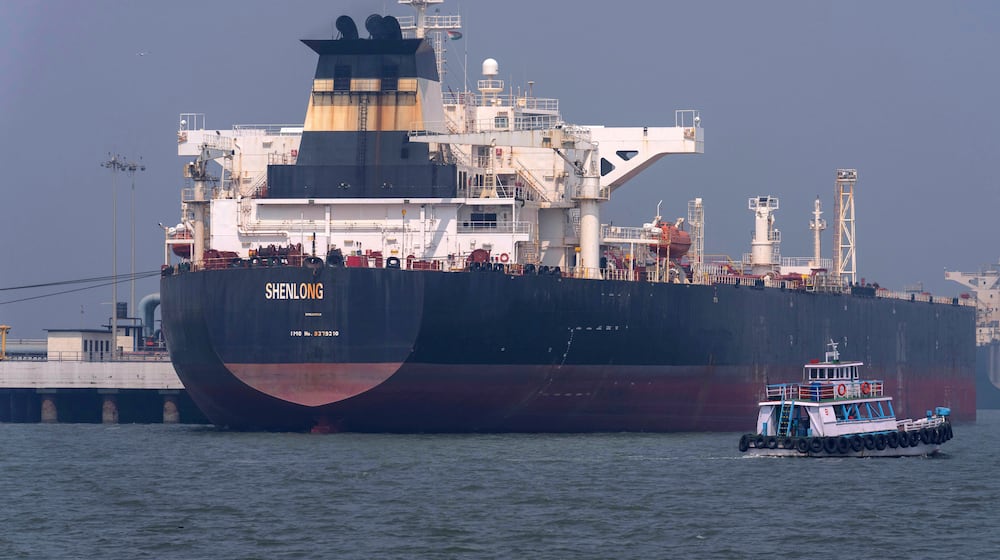FILE - Liberia-flagged tanker Shenlong Suezmax, carrying crude oil from Saudi Arabia, that arrived clearing the Strait of Hormuz, is seen at the Mumbai Port in Mumbai, India, Thursday, March 12, 2026. (AP Photo/Rafiq Maqbool, File)