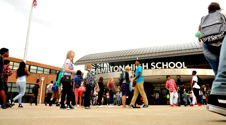 Hamilton Schools and the city’s police department have announced a joint agreement to place five additional police officers on patrol in schools starting in August. FILE PHOTO