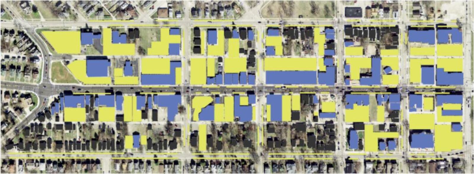 Here's an overhead view of parking lots in the Main Street area. The yellow areas are parking lots, the blue areas are commercial buildings, and black shapes are residences. PROVIDED