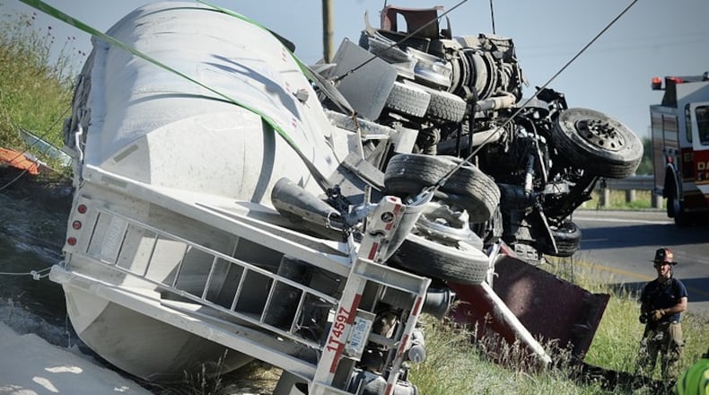 Two people died in a semi truck crash on northbound I-75 over Stanley Avenue early Thursday morning June 1, 2023. MARSHALL GORBY / STAFF