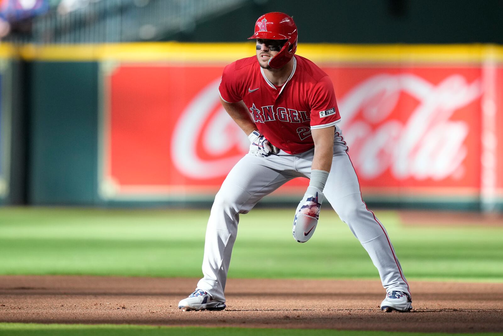 Los Angeles Angels' Mike Trout leads off first base during the first inning of a baseball game against the Houston Astros, Saturday, April 12, 2025, in Houston. (AP Photo/Kevin M. Cox)