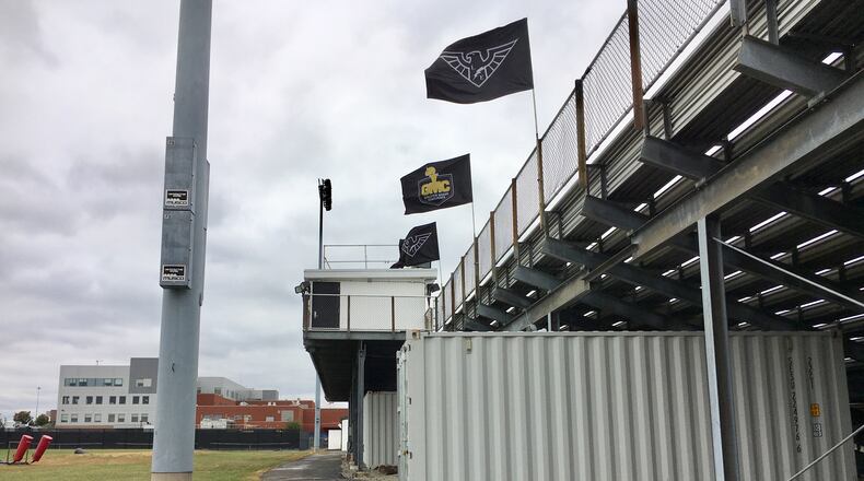 Fans at a football game at Lakota East High School had to scramble over a fence to get to a bleeding and injured 4-year-old boy who fell two stories from the back of stands, according to 911 recordings. More than a half-dozen callers to police dispatchers flooded in after the boy was discovered on the asphalt behind the stands of the Liberty Township school.(Photo by Michael D. Clark/Journal-News)