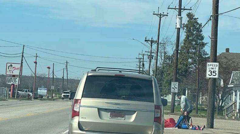 A skydiver was assisted by drivers April 2, 2023 who say she landed on Germantown Road in Middletown. TORI GLOVER/S=CONTRIBUTED