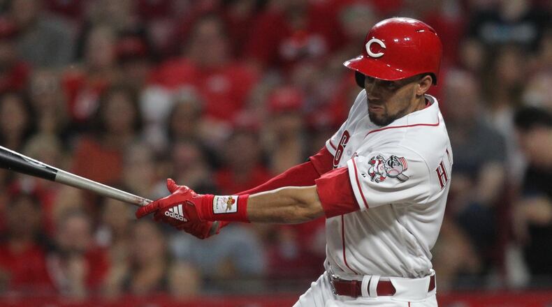 The Reds Billy Hamilton singles against the Pirates on Tuesday, May 22, 2018, at Great American Ball Park in Cincinnati. David Jablonski/Staff