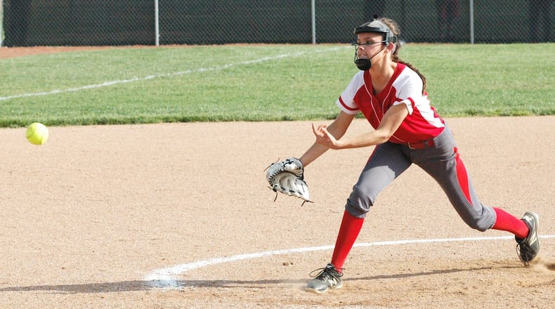 Carlisle pitcher Abby Goodpaster delivers a pitch Wednesday during a Division III sectional softball game against visiting Indian Lake. Carlisle won 2-1. RICK CASSANO/STAFF