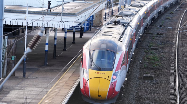 A train is parked at the station after a mass stabbing on a London-bound train in Huntingdon, England, Sunday, Nov. 2, 2025.(AP Photo/Kirsty Wigglesworth)