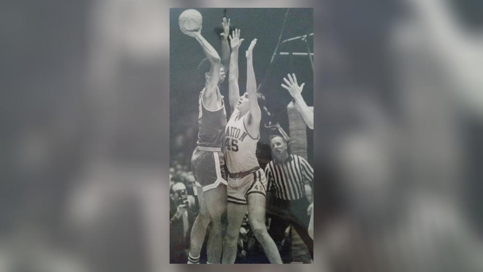 UCLA's Lew Alcindor, later known as Kareem Abdul-Jabbar, shoots over Dayton's Ned Sharpenter in the 1967 national title game. CONTRIBUTED PHOTO