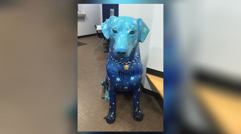 This large artistic dog was donated to Middletown police by Middletown grad and Chicago Cub Kyle Schwarber. It now sits in the lobby. MIDDLETOWN DIVISION OF POLICE