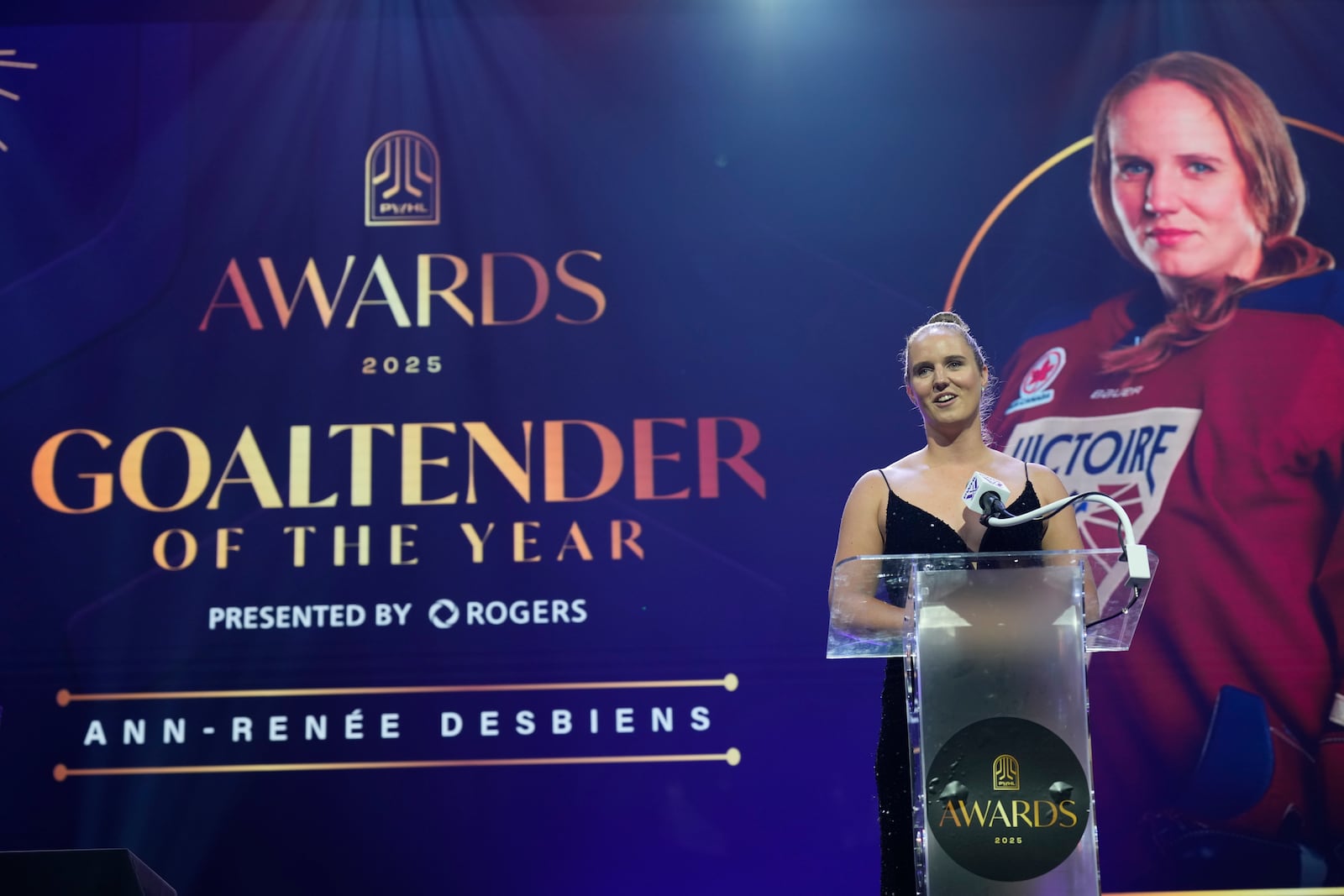 Montreal Victoire's Ann-Renee Desbiens speaks after being named the Goaltender of the Year during the PWHL women's hockey awards in Ottawa, Ontario,, Wednesday June 25, 2025. (Adrian Wyld/The Canadian Press via AP)
