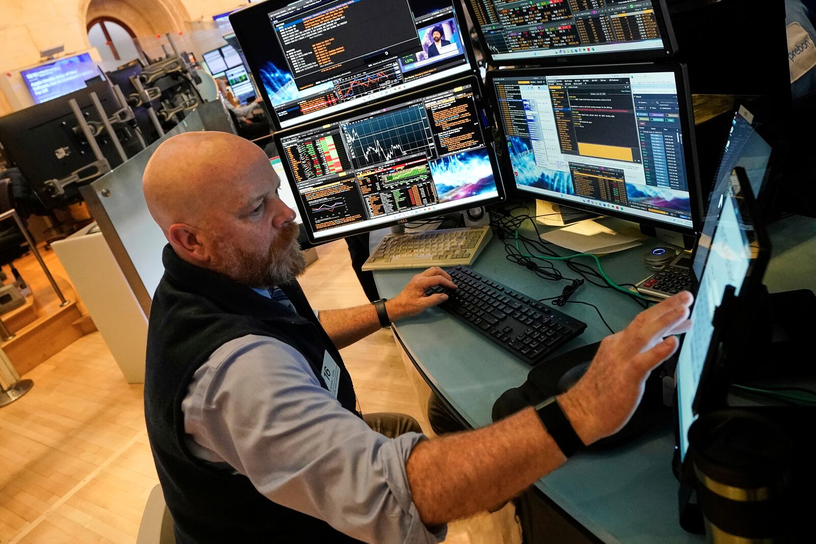 Trader Steven Gohl works on the floor of the New York Stock Exchange, Tuesday, June 10, 2025. (AP Photo/Richard Drew)