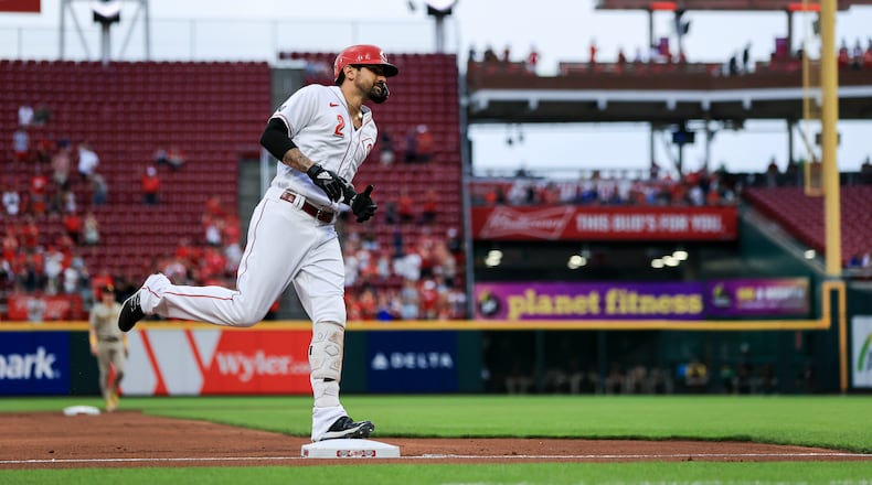 Cincinnati Reds' Nick Castellanos runs the bases after hitting a solo home run during the first inning of a baseball game against the San Diego Padres in Cincinnati, Wednesday, June 30, 2021. (AP Photo/Aaron Doster)