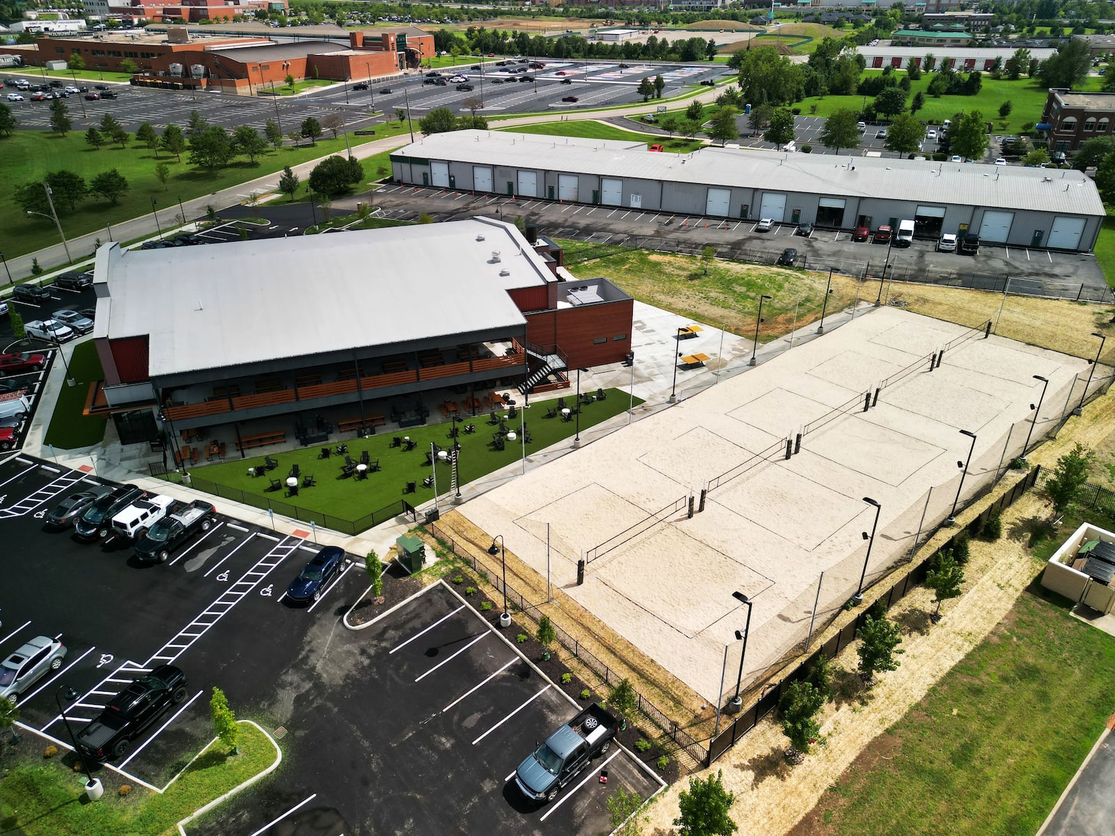 Liberty Collective is set to open on Lakota Lane in Liberty Township. The multi-entertainment complex features five restaurant options, coffee shop, ice cream shop, three bars, outdoor and patio seating, sand volleyball courts and more. NICK GRAHAM/STAFF