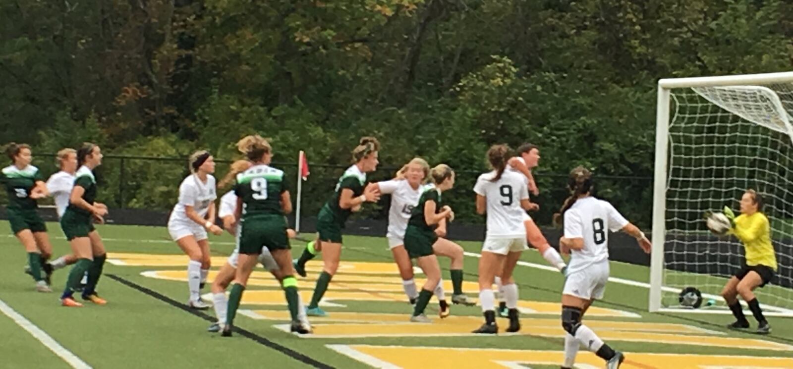 McNicholas goalkeeper Maddie Kouche makes a save during Wednesday night’s game against Badin at Penn Station Stadium in Cincinnati. RICK CASSANO/STAFF