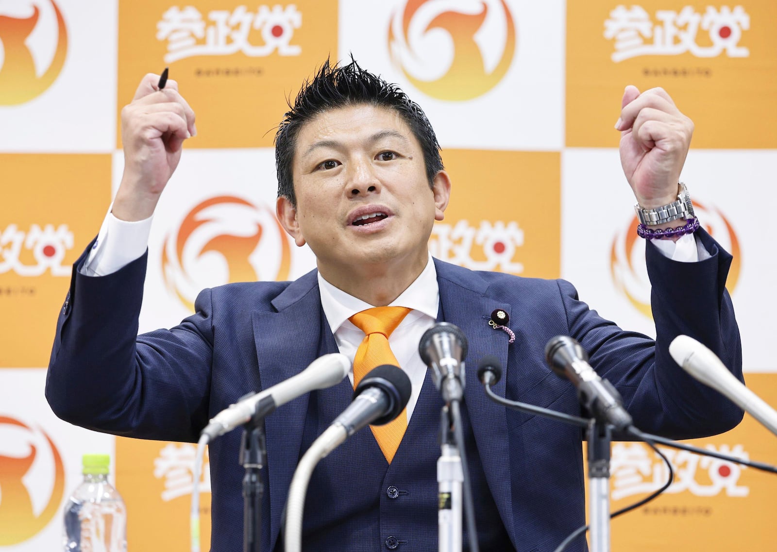 Sohei Kamiya, leader of Sanseito party speaks to the media following the upper house election in Tokyo, Sunday, July 20, 2025. (Kyodo News via AP)