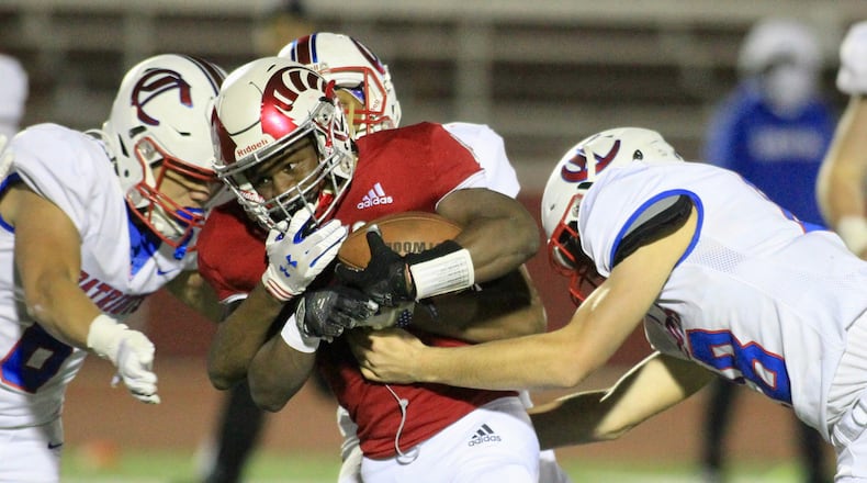 Trotwood-Madison's Hezekiah Hudson-Davis run against Carroll on Friday, Oct. 16, 2020, in Trotwood. David Jablonski/Staff