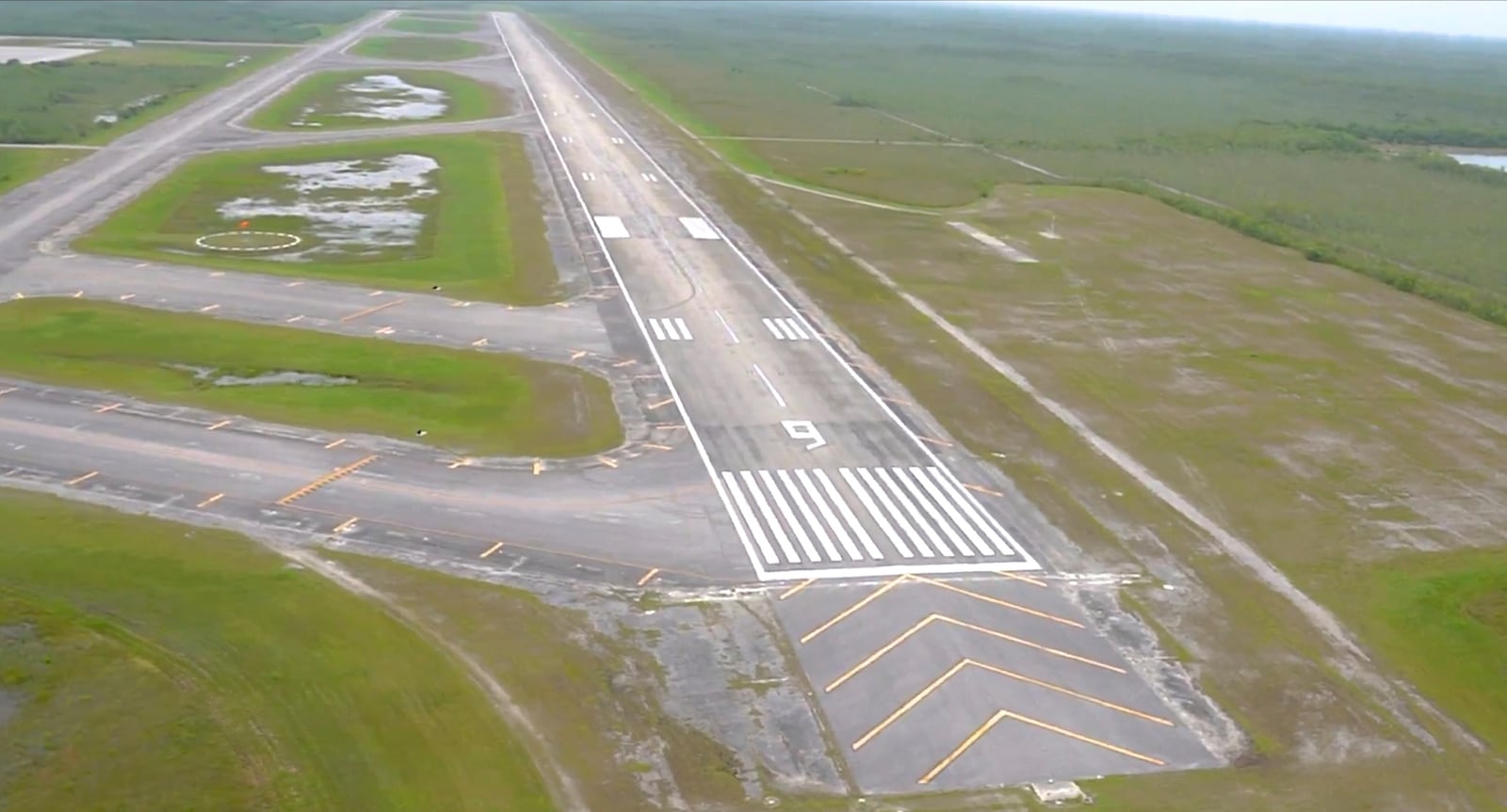 In this image from undated video released by the Office of Attorney General James Uthmeier shows an isolated Everglades airfield about 45 miles (72 kms.) west of Miami that Florida officials said an immigration detention facility dubbed "Alligator Alcatraz" is just days away from being operational. (Courtesy of the Office of Attorney General James Uthmeier via AP)