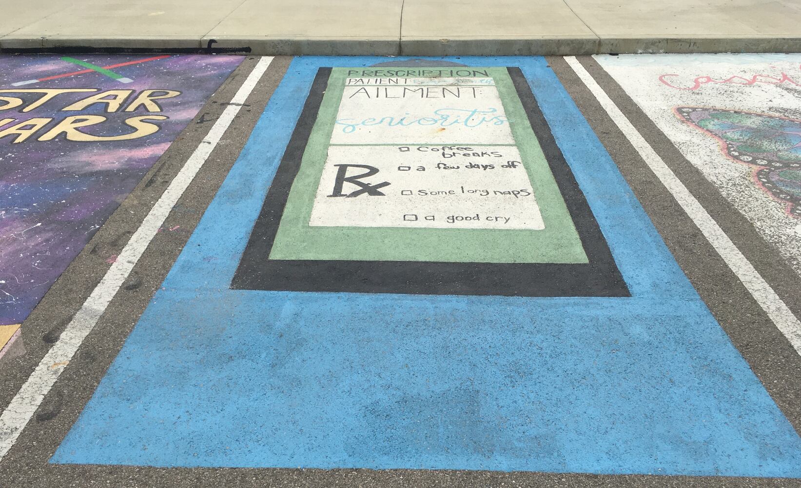Middletown High School Seniors painted their parking lot spaces for the '21-22 school year.