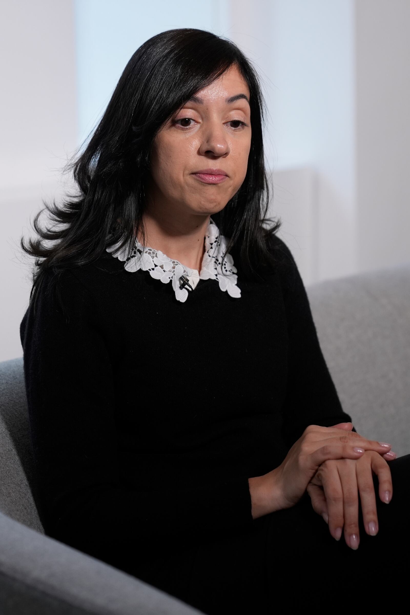 Casandra Almonte speaks to reporters in New York, Thursday, March 20, 2025. (AP Photo/Seth Wenig)