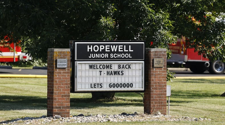 Crews from multiple departments were called to a fire at Lakota's Hopewell Junior School Monday, Sept. 4, 2023 on Cox Road in West Chester Township. NICK GRAHAM/STAFF