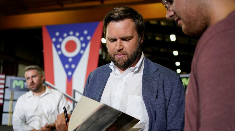 JD Vance, the venture capitalist and author of "Hillbilly Elegy", speaks with supporters following a rally Thursday, July 1, 2021, in Middletown, Ohio, where he announced he is joining the crowded Republican race for the Ohio U.S. Senate seat being left by Rob Portman. (AP Photo/Jeff Dean)