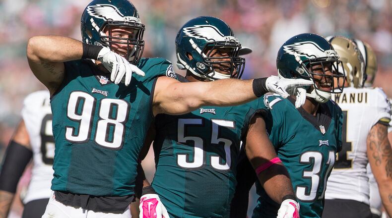 PHILADELPHIA, PA - OCTOBER 11: Connor Barwin #98, Brandon Graham #55, and Byron Maxwell #31 of the Philadelphia Eagles react after the Eagles recovered a fumble in the third quarter against the New Orleans Saints on October 11, 2015 at Lincoln Financial field in Philadelphia, Pennsylvania. The Eagles defeated the Saints 39-17. (Photo by Mitchell Leff/Getty Images)