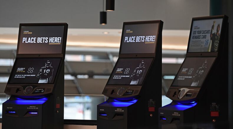 Ohioans across the state are betting big at kiosks like this one inside Caesars Sportsbook inside Rocket Mortgage FieldHouse in Cleveland and on smartphone sportsbook apps. There were about 2.3 million unique betting accounts that placed a wager in Ohio throughout January. (AP Photo/David Dermer)