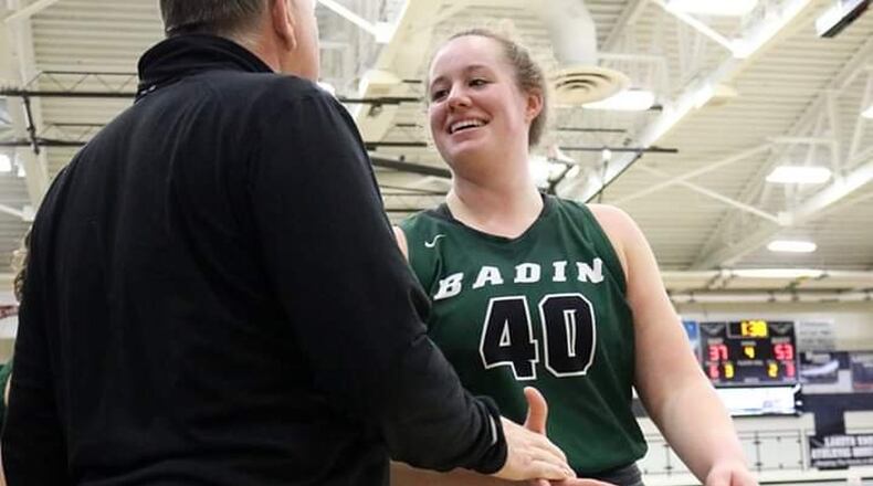 Badin senior forward Emma Broermann is congratulated after coming off the floor toward the end of the Rams’ 53-38 victory at Lakota East on Thursday night. She scored her 1,000th career point in the second quarter. CONTRIBUTED PHOTO BY TERRI ADAMS