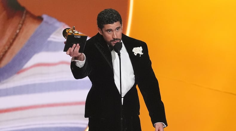 Bad Bunny accepts the award for album of the year for "Debí Tirar Más Fotos" during the 68th annual Grammy Awards on Sunday, Feb. 1, 2026, in Los Angeles. (AP Photo/Chris Pizzello)