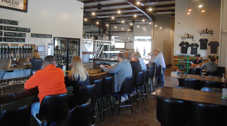 FigLeaf Brewing Co. opened at 3387 Cincinnati-Dayton Road in Middletown this weekend with the capacity for 20 taps. Its first brews include a Basmati Cream Ale, a Red Saison, an American IPA and an Imperial Brown Porter.  ERIC SCHWARTZBERG/STAFF