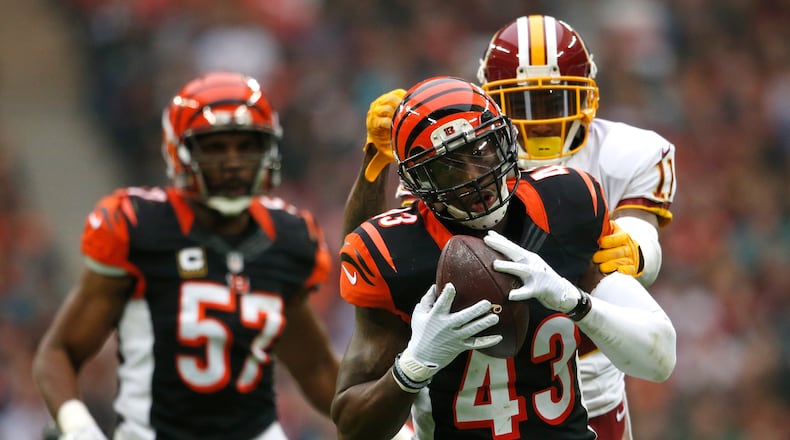Bengals free safety George Iloka intercepted a pass against the Redskins last season in London. More recently, he made a pass at his girlfriend, Gaby Barcelo, and she accepted his singing video proposal and agreed to marry.