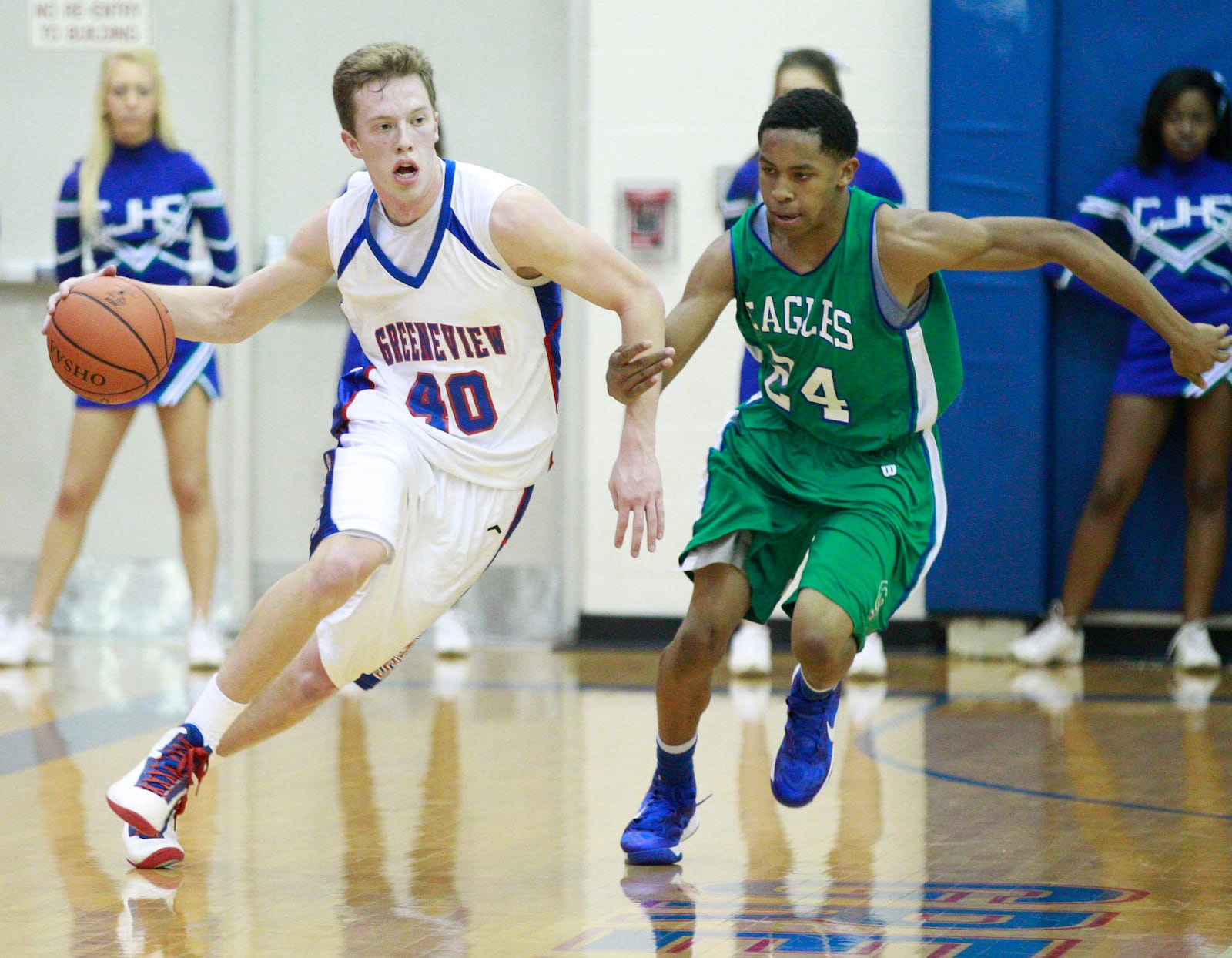 Evan Bradds (40) of Greeneview is guarded by William Peterson (24) of Chaminade Julienne during Friday’s basketball game at Greeneview on Nov. 30, 2012. Photo by Barbara J. Perenic/Cox Media Group