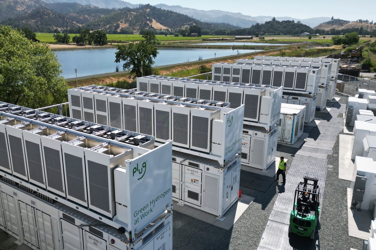 A worker walks through Energy Vault's facility, a company that is creating an emergency power system that relies on hydrogen and battery storage, on Tuesday, May 27, 2025, in Calistoga, Calif. (AP Photo/Terry Chea)