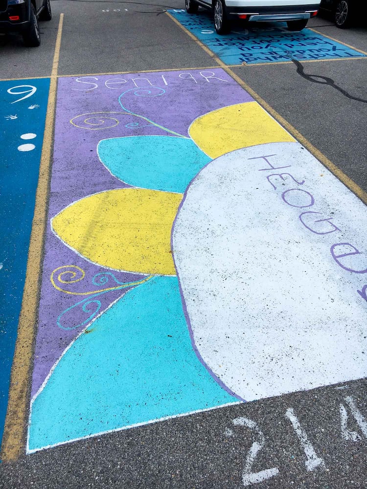PHOTOS Lakota East seniors paint parking spots