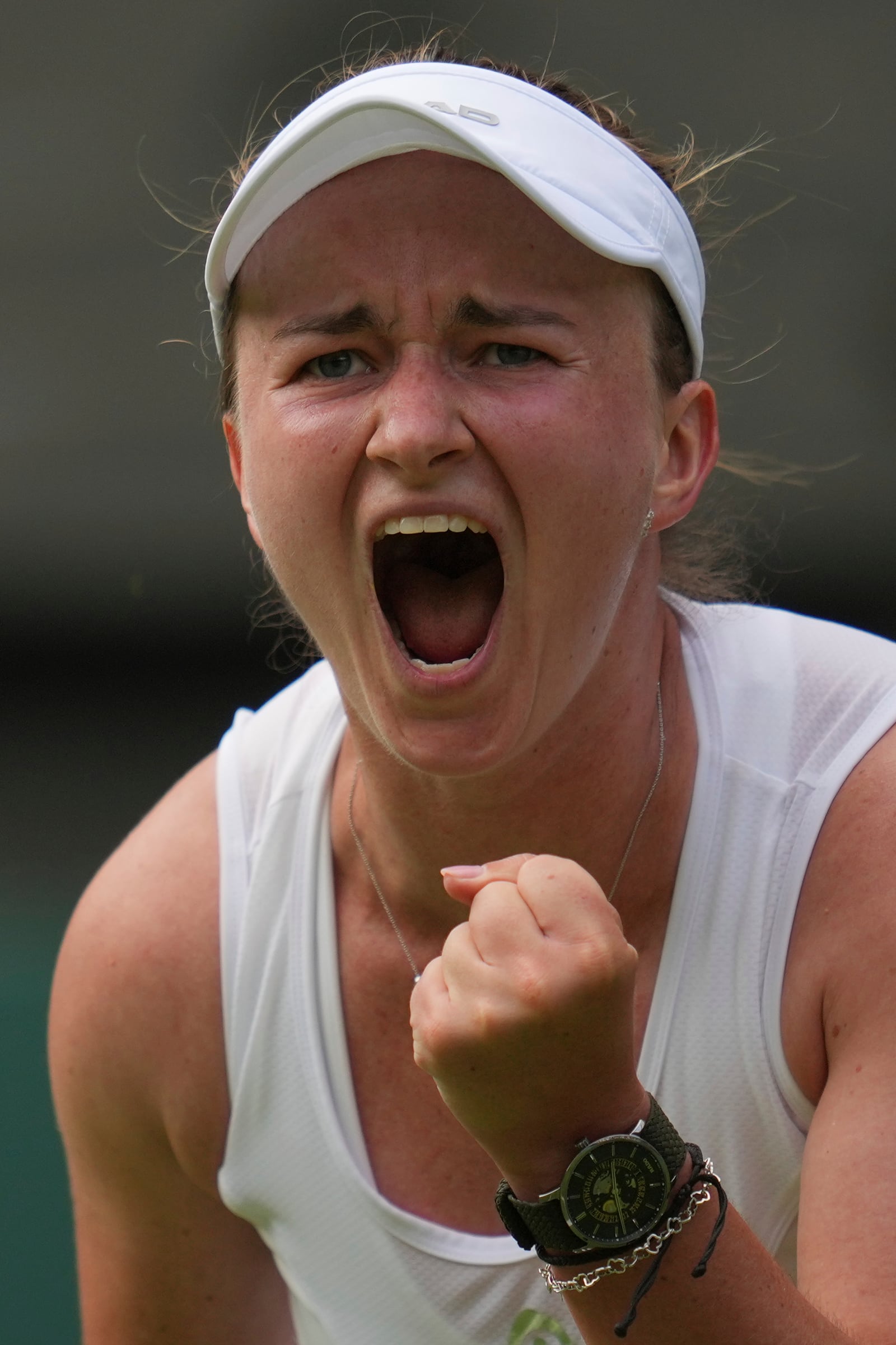 Barbora Krejcikova of Czech Republic celebrates after beating Alexandra Eala of the Philippines in their first round women's singles match at the Wimbledon Tennis Championships in London, Tuesday, July 1, 2025. (AP Photo/Kin Cheung)