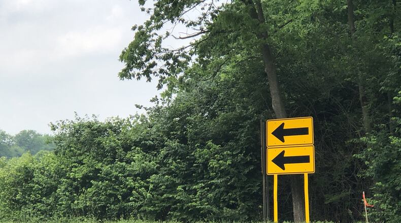 This sharp curve would be eliminated by a new township road to be built in Springboro as a condition of approval of a new subdivision just south of city limits. STAFF/LAWRENCE BUDD