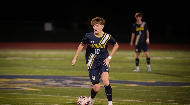 Monroe’s Zachary Oborne looks for a passing lane during a recent game this season. AJ FULLAM / CONTRIBUTED