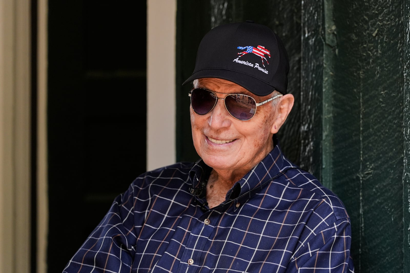 FILE - Trainer D. Wayne Lukas talks to media after arriving at Pimlico Race Course in Baltimore, with Preakness Stakes entrant American Promise, May 12, 2025. (AP Photo/Stephanie Scarbrough, File)