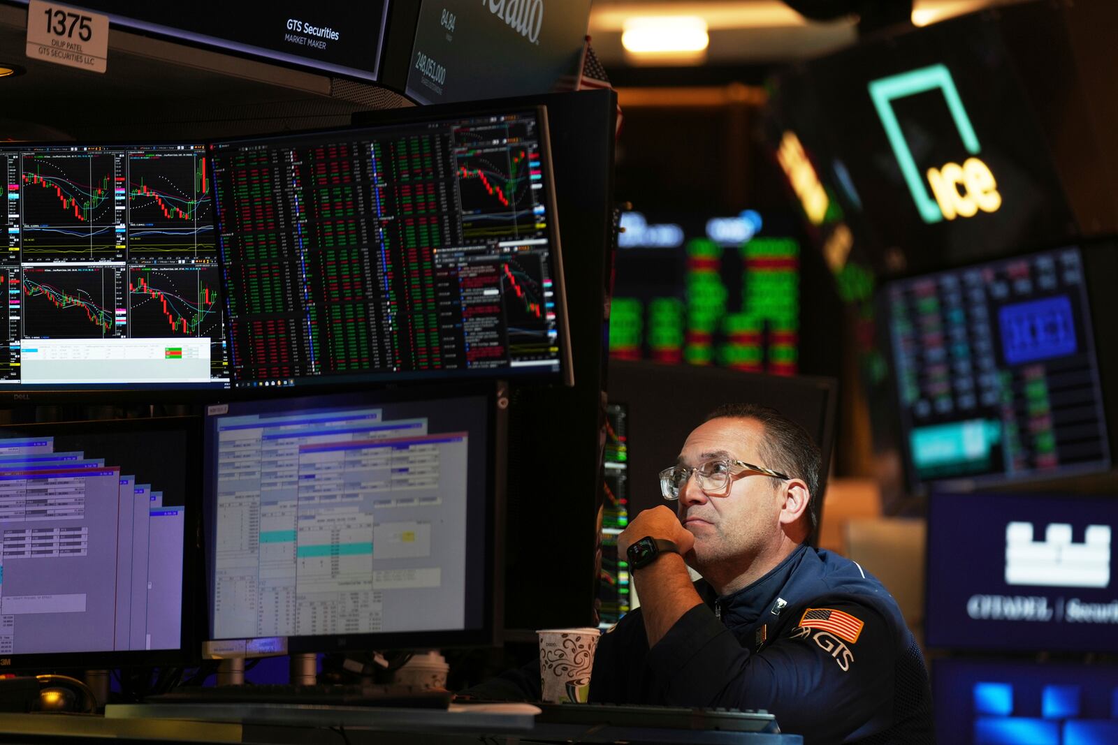 Anthony Matesic works on the floor at the New York Stock Exchange in New York, Wednesday, April 9, 2025. (AP Photo/Seth Wenig)