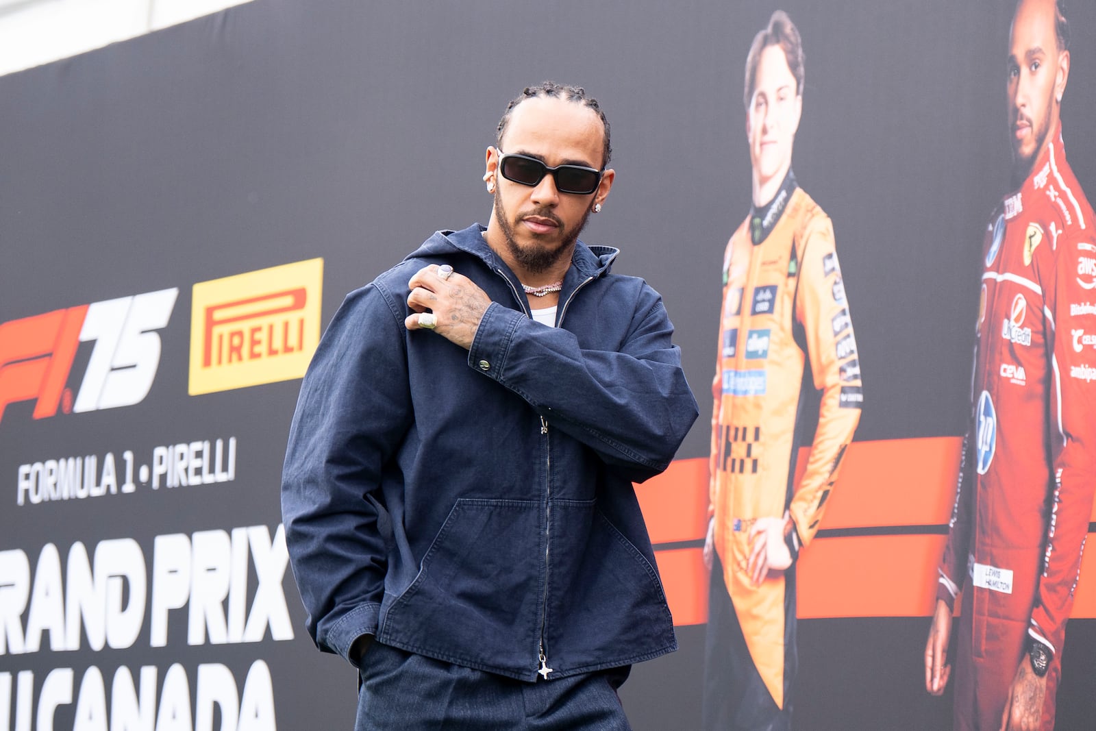 Ferrari driver Lewis Hamilton, of Britian, arrives at the F1 Canadian Grand Prix auto race, Thursday, June 12, 2025, in Montreal. (Christopher Katsarov/The Canadian Press via AP)